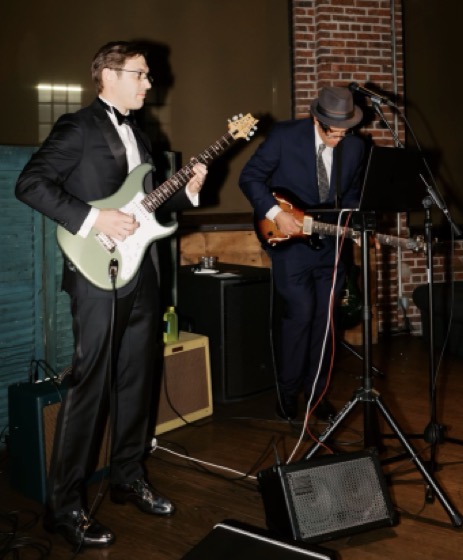 Nick performing a blues solo at his wedding